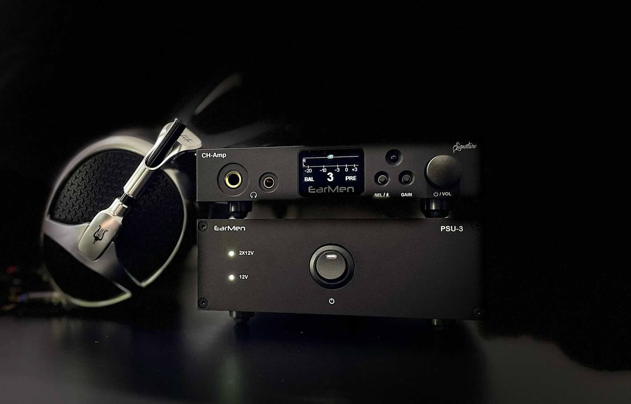 The EarMen CH-Amp Signature powered on with headphones