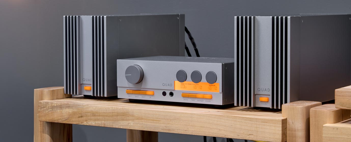 The Quad 33 and 303 side angle view in rack at House of Stereo
