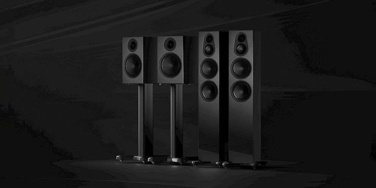 Lineup of black Monitor Audio Silver Series in dark image